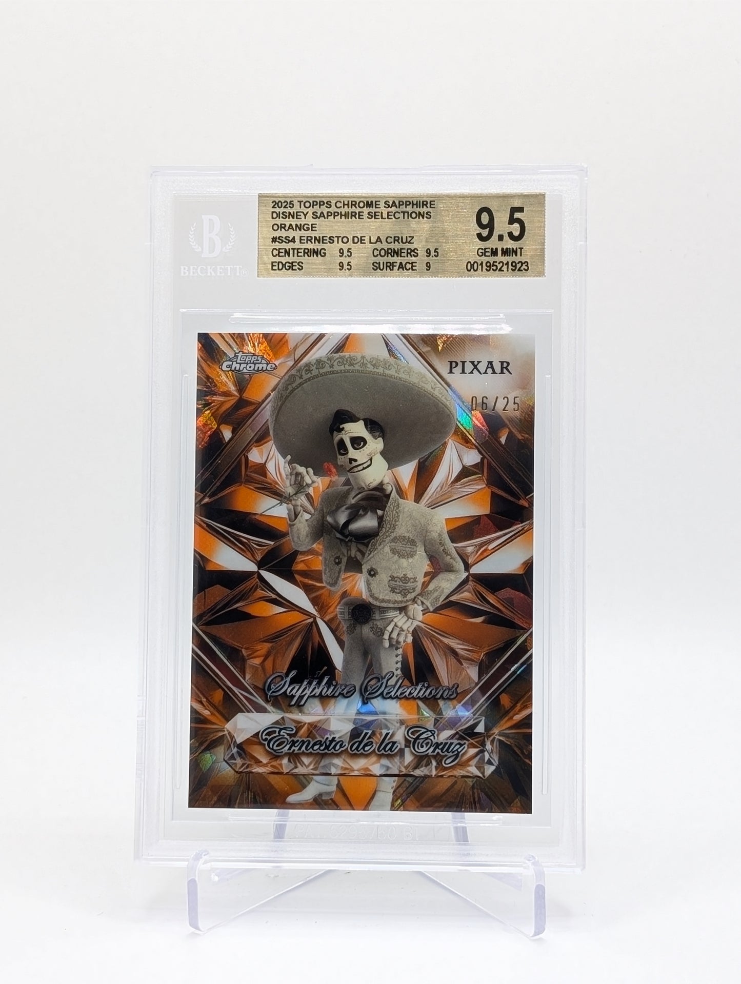 2025 Topps Chrome Disney Sapphire Edition Ernesto De la Cruz Sapphire Selections Orange /25 BGS 9.5